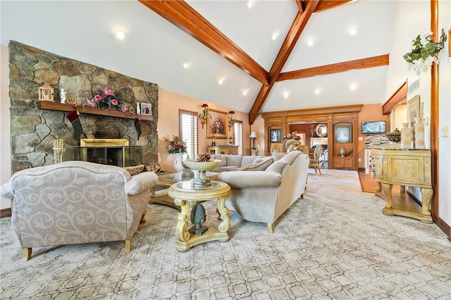 living room featuring beamed ceiling, light colored carpet, high vaulted ceiling, and a fireplace