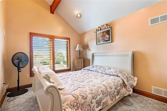 bedroom with beamed ceiling and high vaulted ceiling