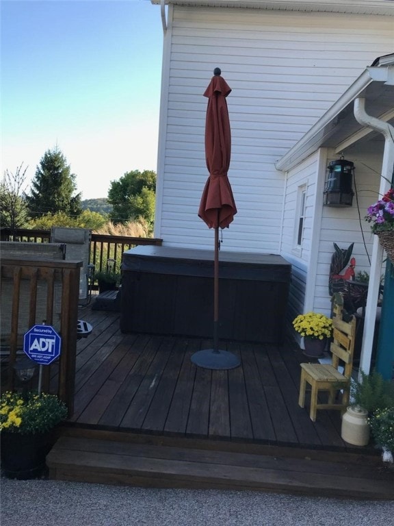 deck with a hot tub