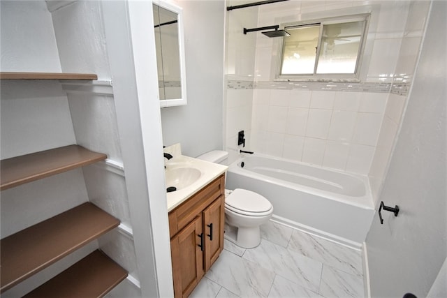 full bathroom with vanity, tiled shower / bath combo, and toilet