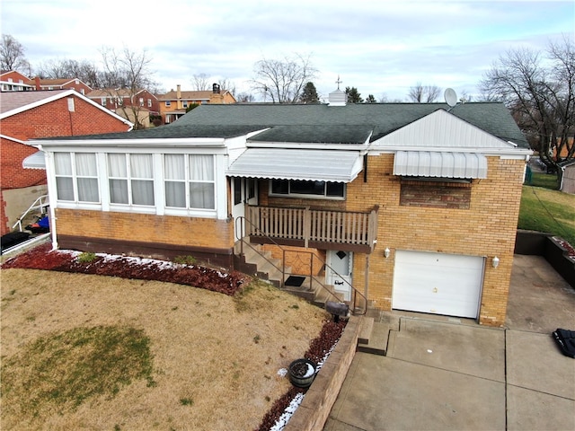 view of front of property with a garage