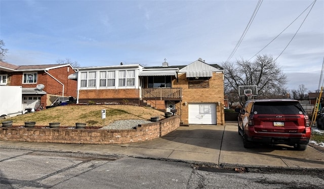 view of front of property featuring a garage