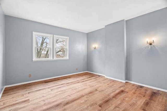 unfurnished room featuring light hardwood / wood-style flooring