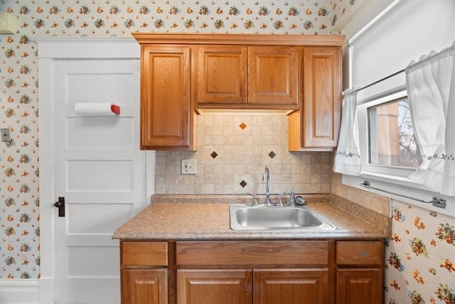 kitchen with tasteful backsplash and sink