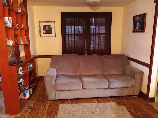 living room with dark wood-type flooring