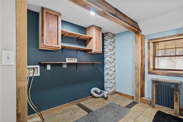 laundry area featuring cabinets and washer hookup