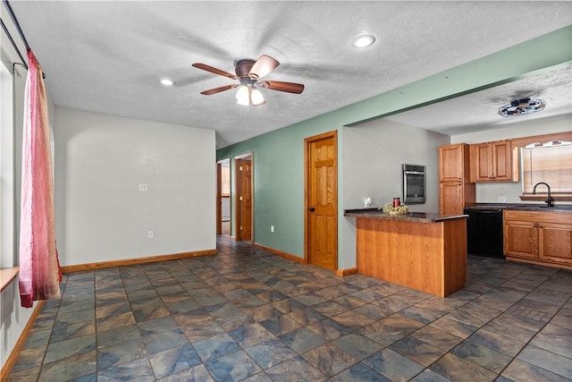 kitchen with dishwasher, sink, ceiling fan, a textured ceiling, and kitchen peninsula