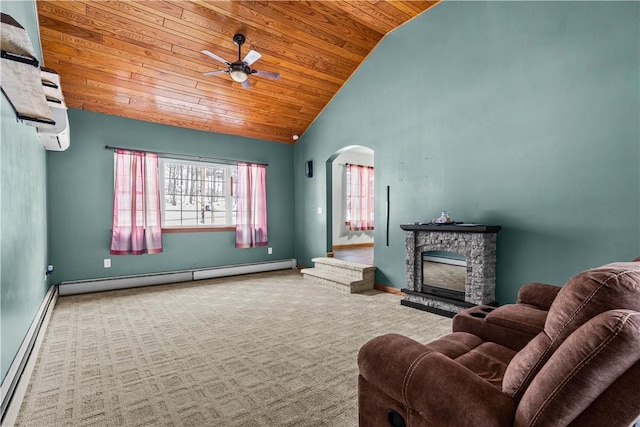 living room featuring baseboard heating, a fireplace, light colored carpet, and wood ceiling