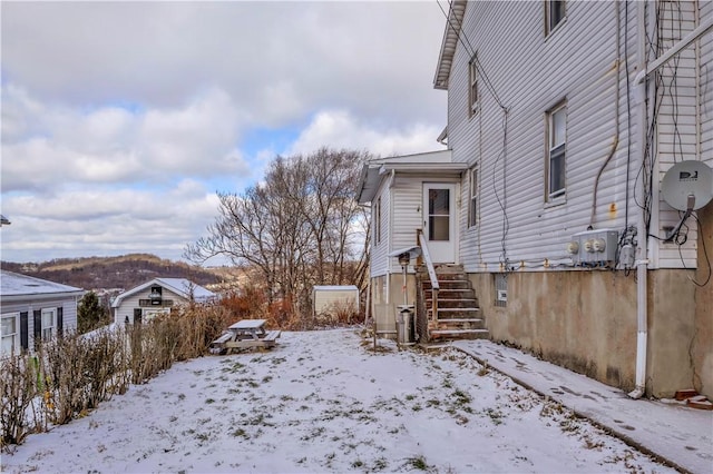 view of yard covered in snow