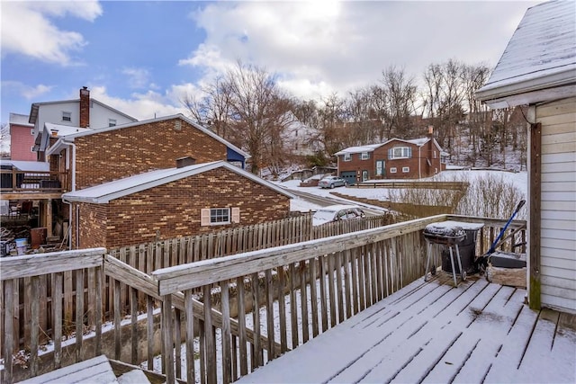 view of snow covered deck