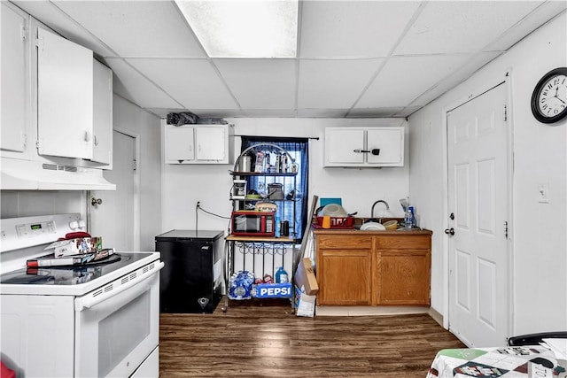 kitchen featuring white cabinets, dark hardwood / wood-style floors, white electric stove, and range hood