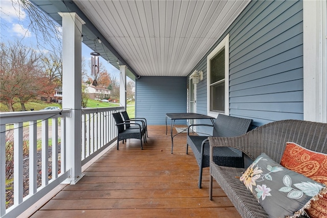 wooden deck featuring a porch