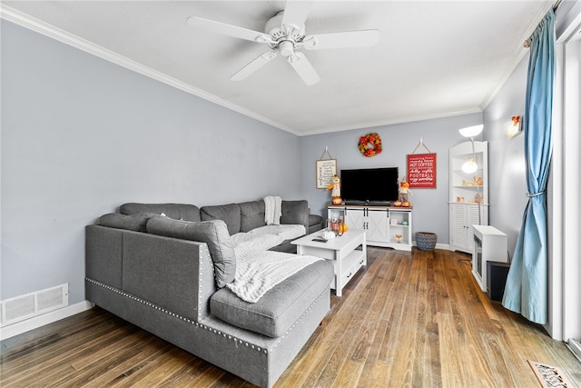 living room with ceiling fan, hardwood / wood-style floors, and ornamental molding