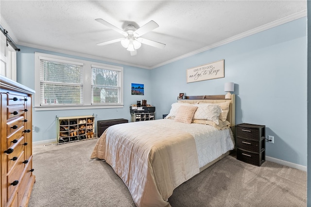 bedroom with ceiling fan, crown molding, light colored carpet, and a textured ceiling