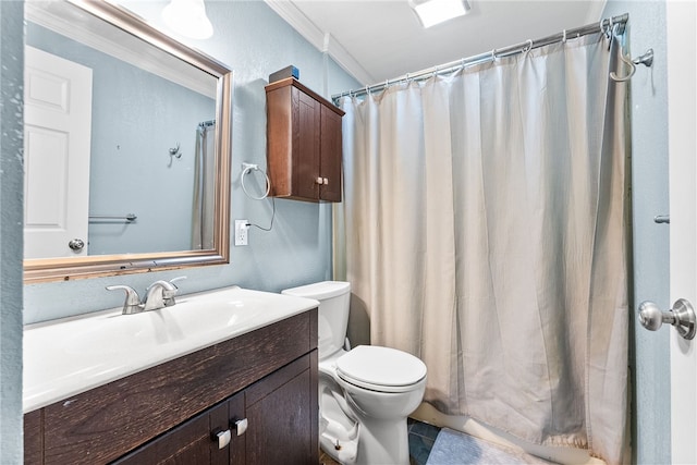 bathroom with vanity, tile patterned floors, toilet, ornamental molding, and walk in shower