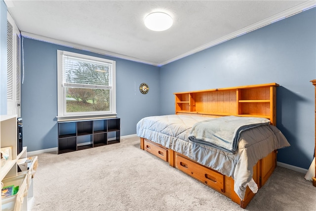 carpeted bedroom featuring crown molding