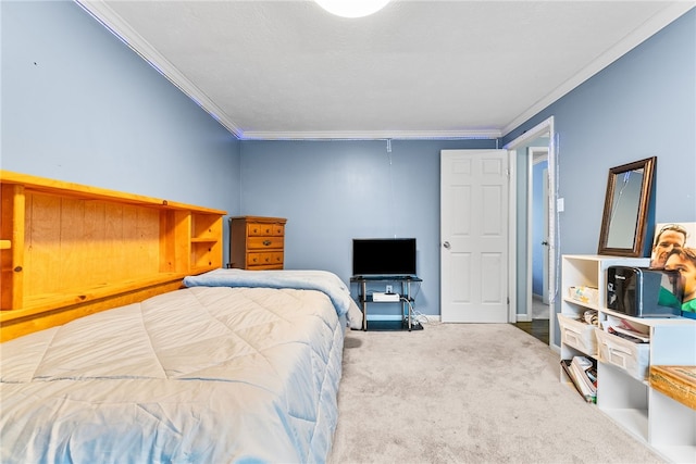 carpeted bedroom with ornamental molding