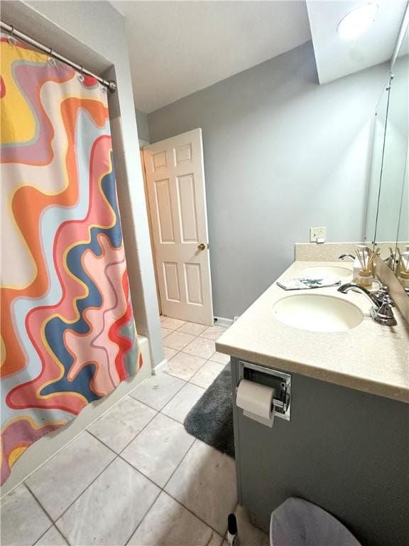 bathroom featuring tile patterned floors and vanity