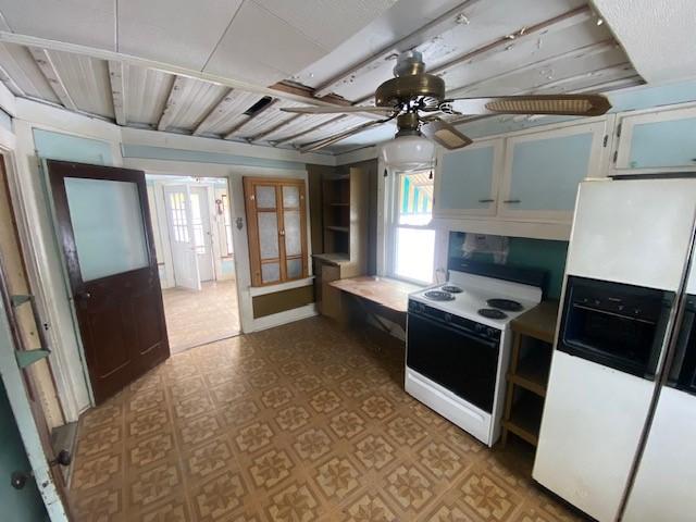 kitchen with ceiling fan, french doors, and white appliances