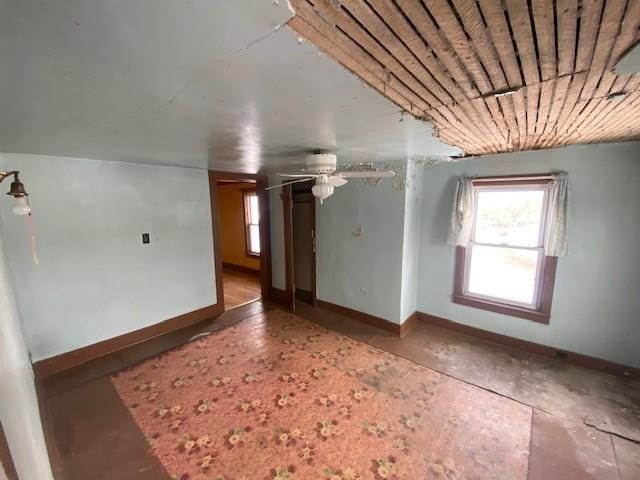 unfurnished room featuring ceiling fan