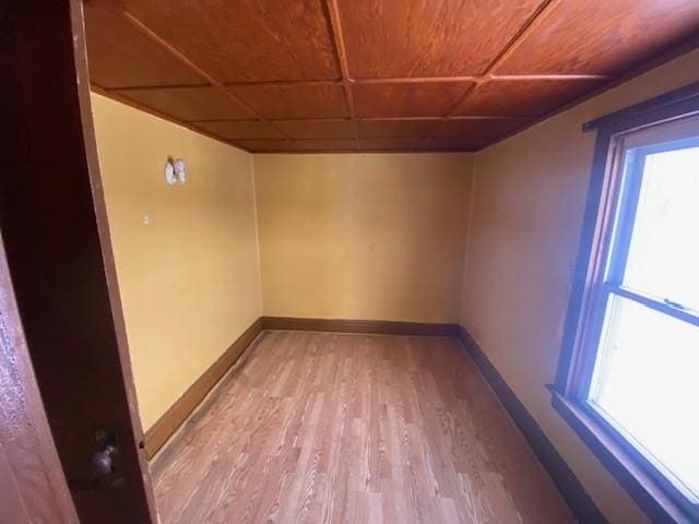 unfurnished room with light hardwood / wood-style flooring