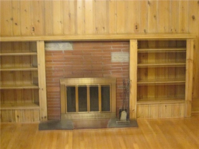 unfurnished living room with hardwood / wood-style floors