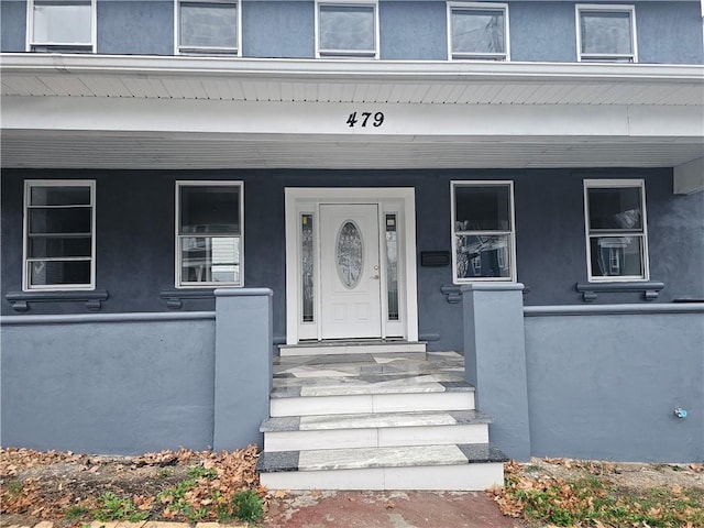 entrance to property with covered porch