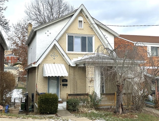 view of front of property featuring covered porch