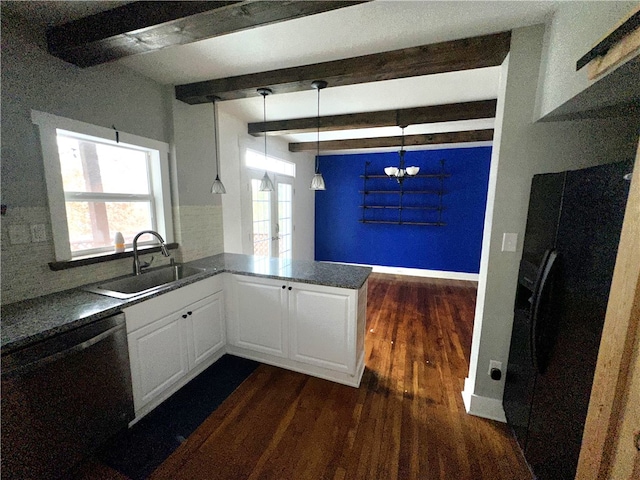 kitchen with dishwasher, sink, kitchen peninsula, decorative light fixtures, and white cabinets