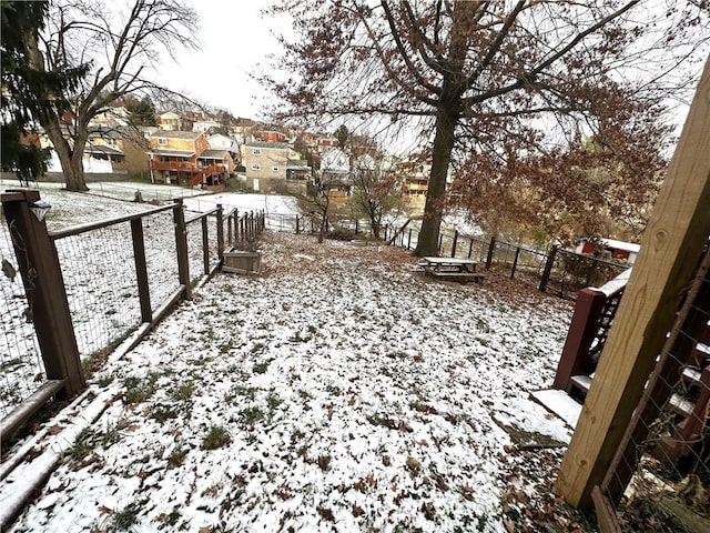 view of yard covered in snow