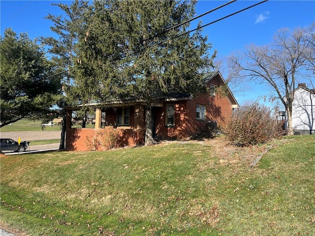 view of front of home with a front yard