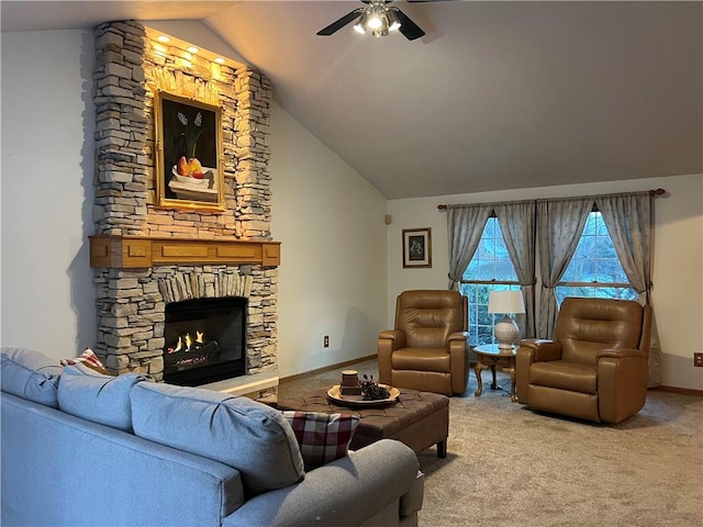 living room featuring a stone fireplace, lofted ceiling, baseboards, ceiling fan, and carpet
