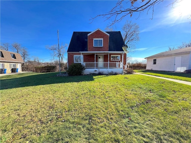 view of front of home with a front lawn and covered porch