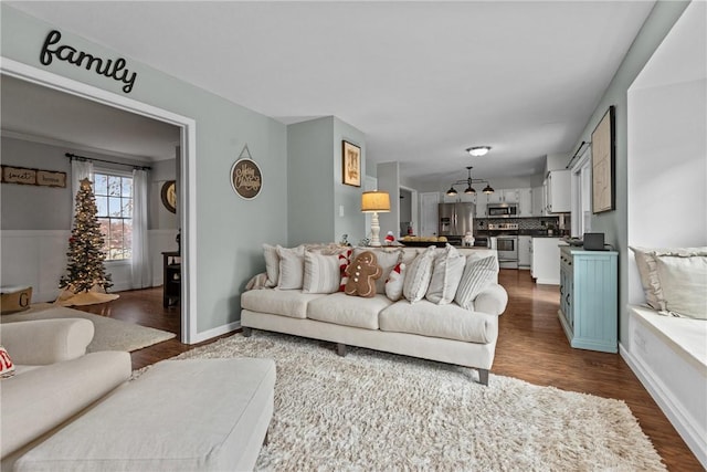 living room featuring dark hardwood / wood-style flooring