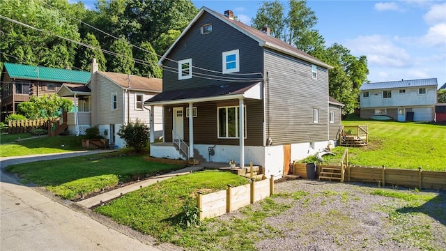 view of front facade featuring a front yard