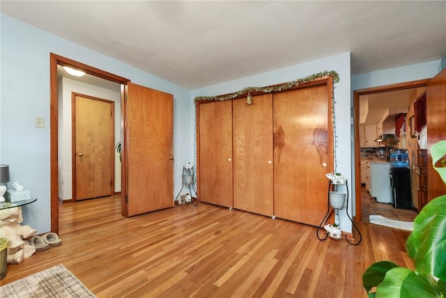 bedroom featuring light wood-type flooring