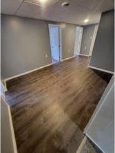 basement with dark wood-type flooring