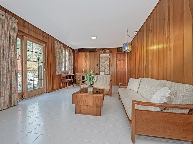 living room featuring wood walls