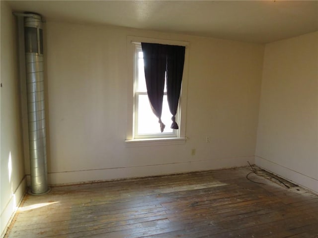 empty room featuring hardwood / wood-style floors