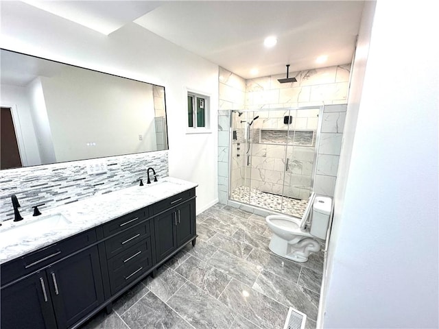 bathroom featuring decorative backsplash, vanity, toilet, and walk in shower