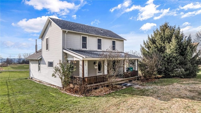 view of front of home featuring a front lawn and a porch