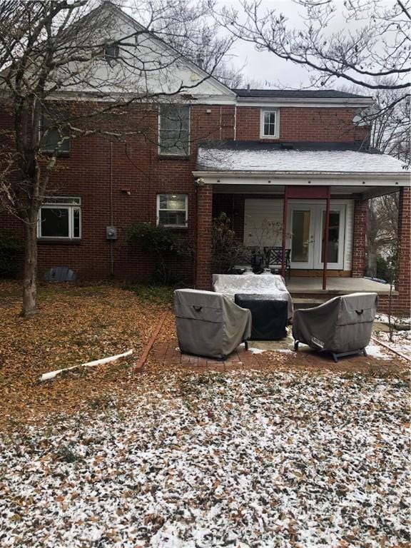 view of snow covered house