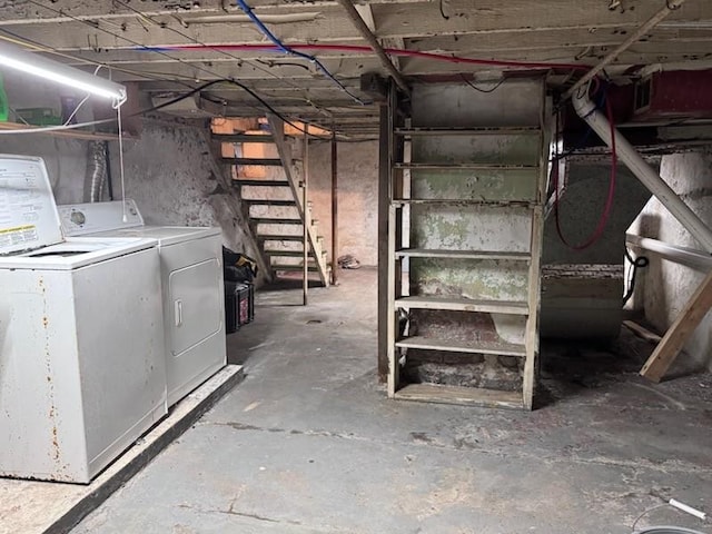 basement with washing machine and dryer