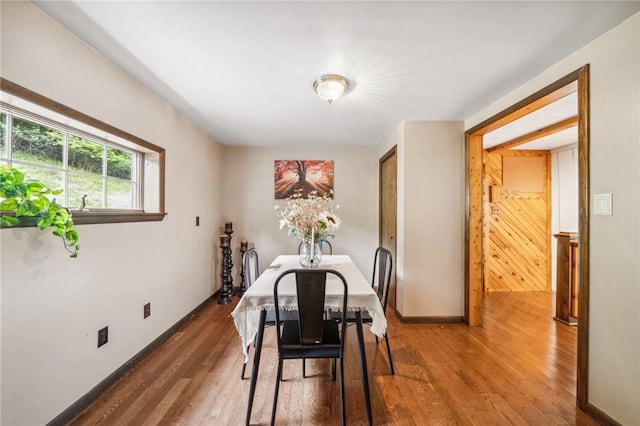 dining area featuring dark hardwood / wood-style floors