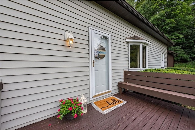 entrance to property featuring a deck