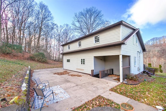 back of house with a patio area