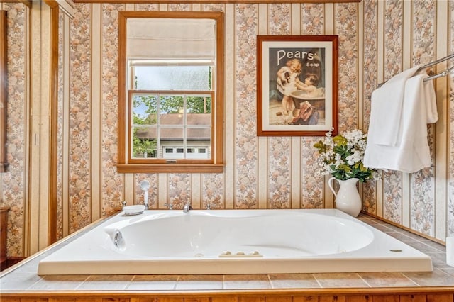 bathroom with a relaxing tiled tub