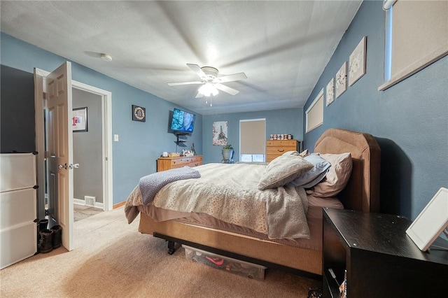 bedroom featuring carpet and ceiling fan