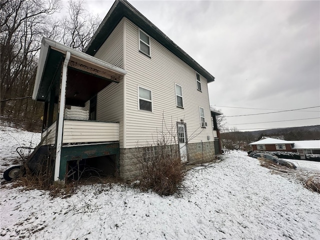 view of snow covered property