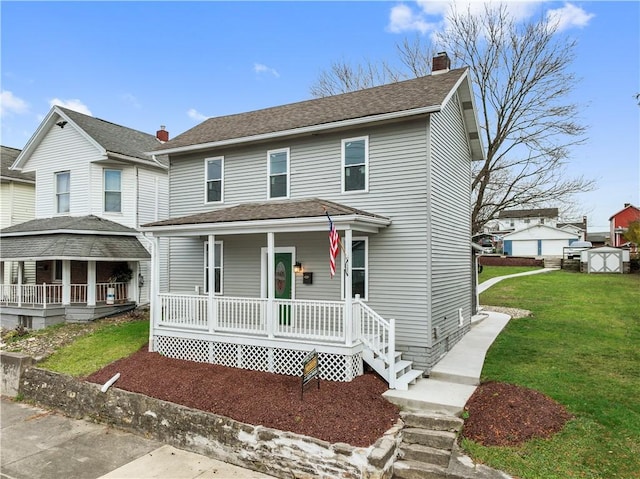 view of front of house featuring a porch and a front yard